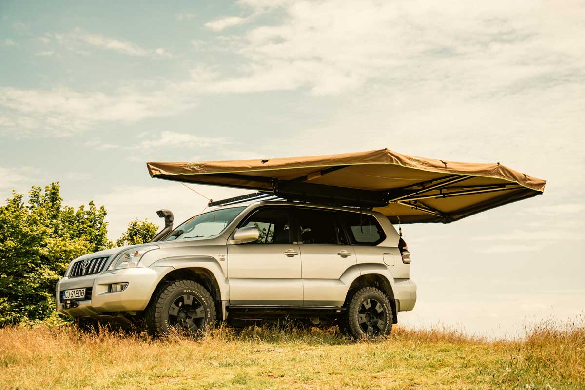 EDGE Overland Infinity 270 Freestanding Car Awning opened on a hill