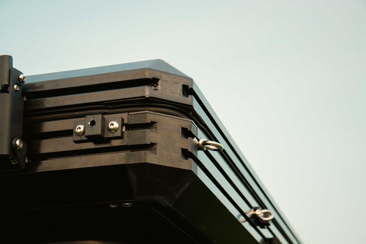 Explore One Hardshell Rooftop Tent showing the T slots for accessory attachment