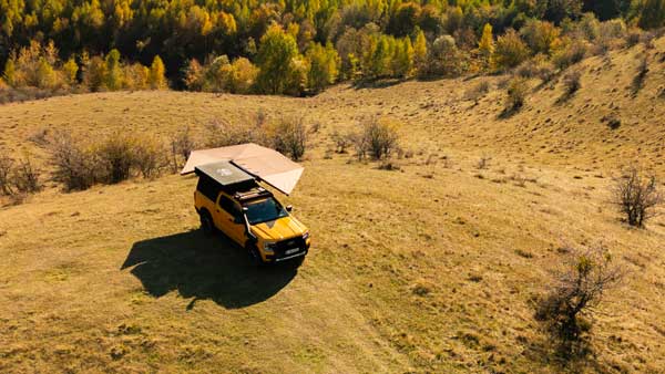 EDGE Overland awning deployed whilst camping in the wild