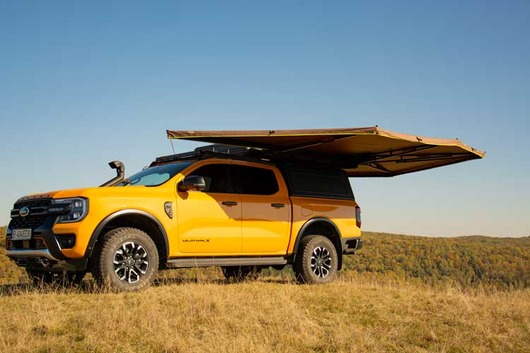 Left side view of open freestanding awning
