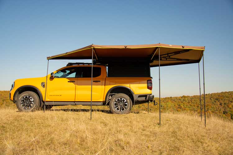 Freestanding awning with legs deployed
