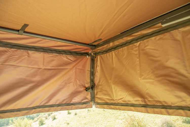 Inside view of the Shelter Max sidewall extensions, featuring heavy-duty zippers and velcro straps